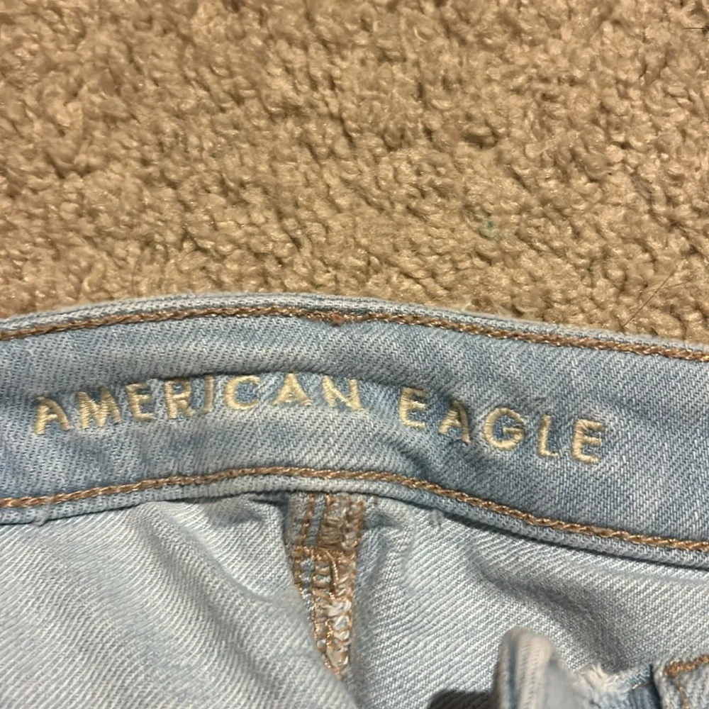 Stylish Light Blue Distressed Women's Jeans - Picture 2 of 3